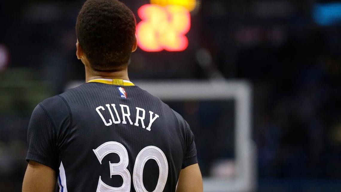 The Golden State Warriors’ Stephen Curry looks up to the scoreboard during an NBA basketball game against the Milwaukee Bucks Saturday, Dec. 12, 2015, in Milwaukee. The Warriors lost 108-95, ending their 24-game winning streak.