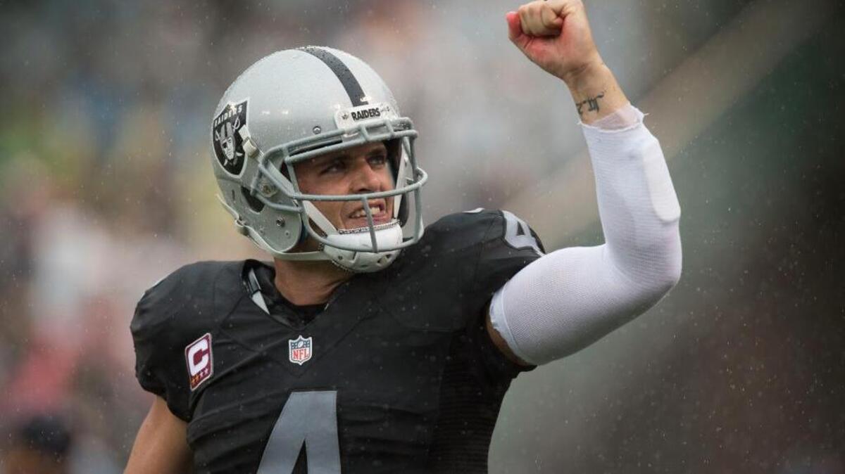 Oakland Raiders quarterback Derek Carr celebrates a touchdown against the Kansas City Chiefs at the Coliseum on Sunday, Oct. 16, 2016, in Oakland, Calif. Carr will go head-to-head with Blake Bortles when the Raiders meet the Jaguars on Sunday, Oct. 23, 2016 in Jacksonville, Fla.