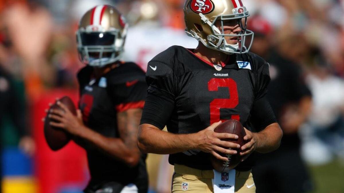 Mike Garafolo of FOX Sports 1 gives the inside track to the 49ers’ starting job to Blaine Gabbert (2). Colin Kaepernick, left, is being rested because of a “tired” arm.