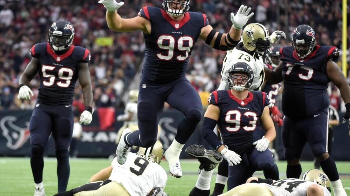 Houston Texans defensive end J.J. Watt (99) leaps after sacking New Orleans Saints quarterback Drew Brees (9) during the third quarter of an NFL football game, Sunday, Nov. 29, 2015, in Houston. The Saints were held without a touchdown for the first time since Dec. 24, 2005.