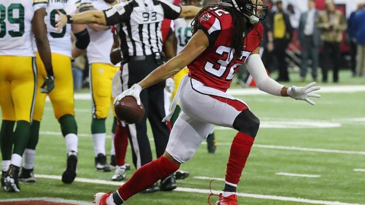 Atlanta’s Jalen Collins reacts after recovering a Green Bay fumble inside the Falcons’ 1, where officials ruled his momentum carried him into the end zone for a touchback.