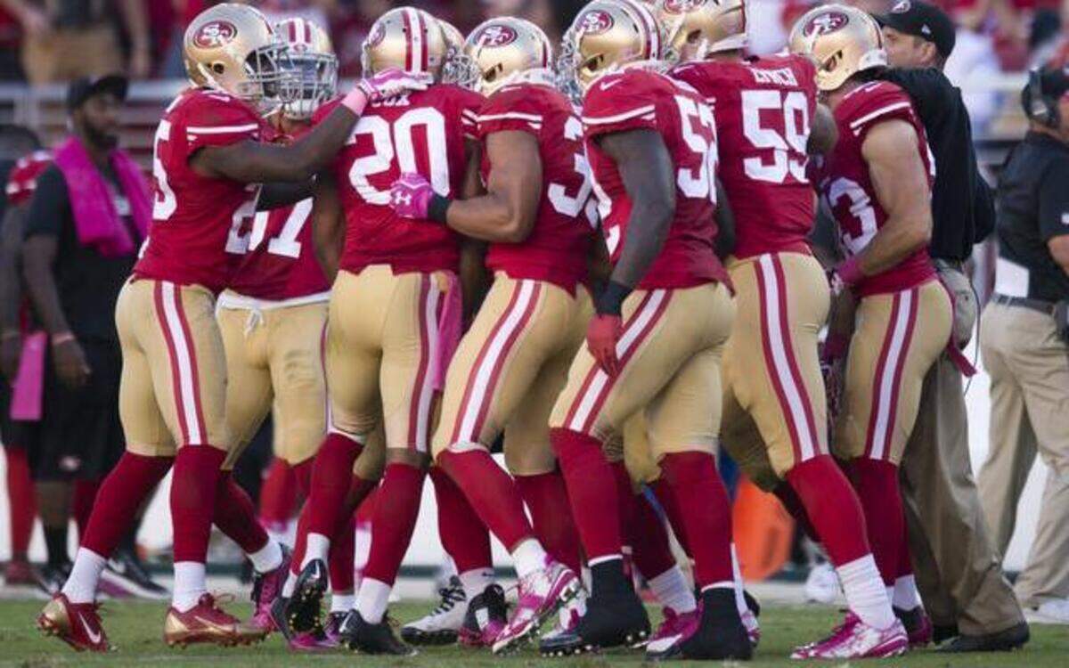 
San Francisco 49ers cornerback Perrish Cox (20), surrounded by teammates after making an interception on Oct. 5 against Kansas City, has been one of the top secondary defenders in the league this season.
