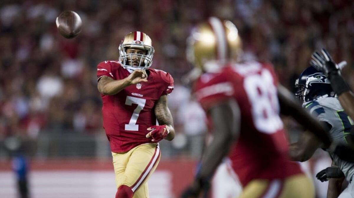 San Francisco quarterback Colin Kaepernick (7), passing toward wide receiver Anquan Boldin, leads the 49ers into St. Louis to play the Rams at 10 a.m. on Sunday, Nov. 1, 2015.