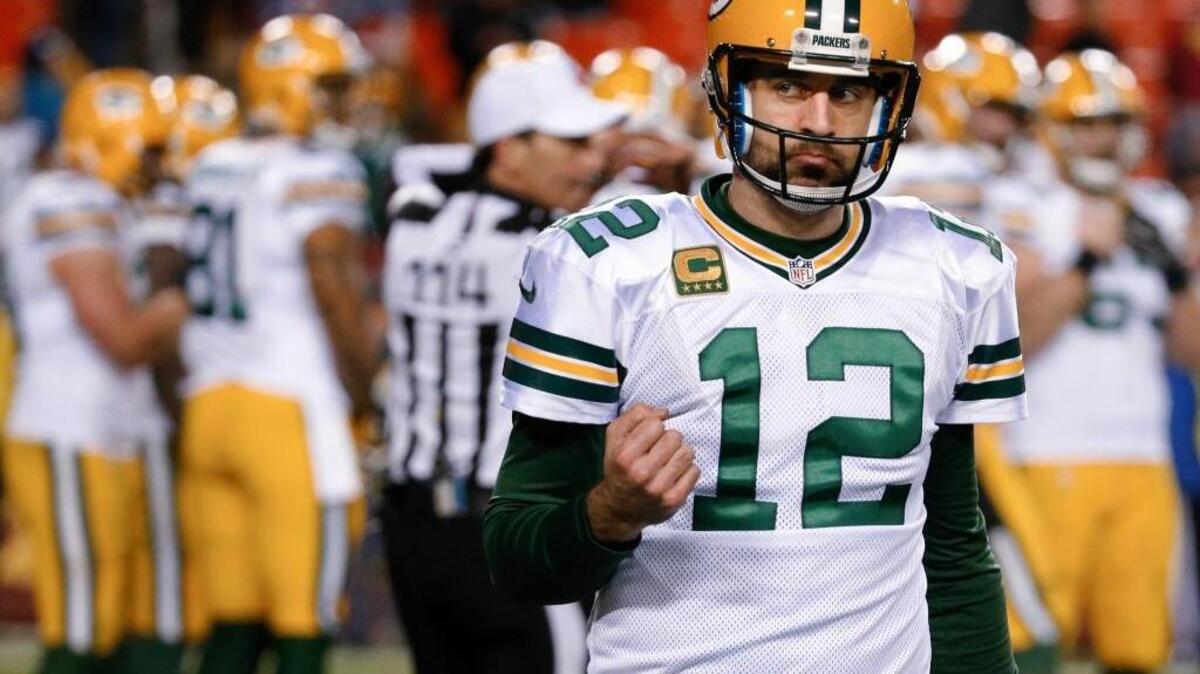 Green Bay Packers quarterback Aaron Rodgers pumps his fist in the closing minutes of an NFC wild card victory over the Washington Redskins on Sunday, Jan. 10, 2016, in Landover, Md. The Packers won 35-18.