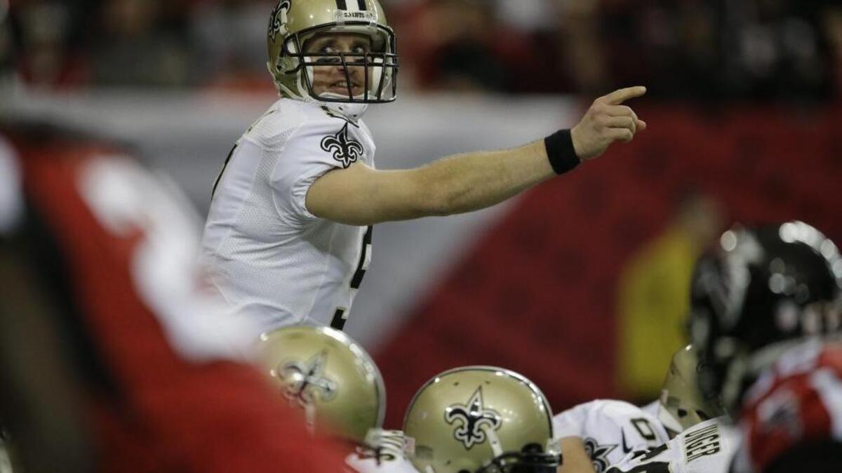 Regular season passing leader Drew Brees threw for 505 yards and seven touchdowns in the New Orleans Saints’ Week 8 victory. ... Drew Brees directs his team during an NFL game against the Atlanta Falcons , Sunday, Jan. 3, 2016, in Atlanta.