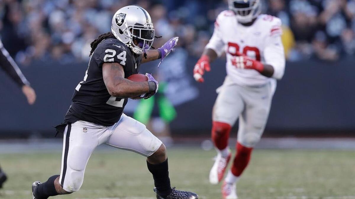 Oakland Raiders running back Marshawn Lynch (24) runs against the New York Giants on Dec. 3 in Oakland.