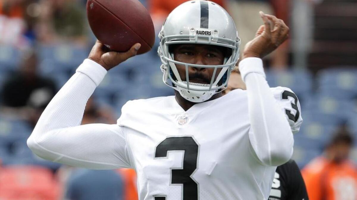 Oakland Raiders quarterback EJ Manuel warms up before facing the Denver Broncos on Oct. 1 in Denver.