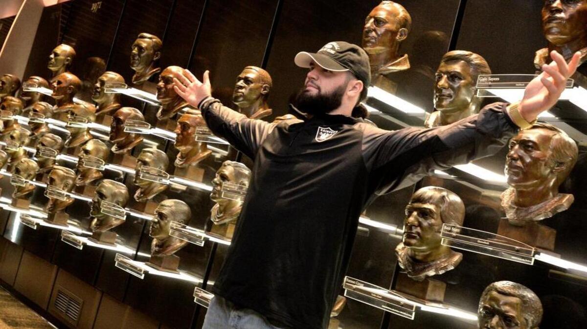 
Raiders linebacker Ben Heeney poses in the bust gallery during a visit to the Pro Football Hall of Fame on June 24, in Canton, Ohio, as part of the NFL Rookies Symposium.
