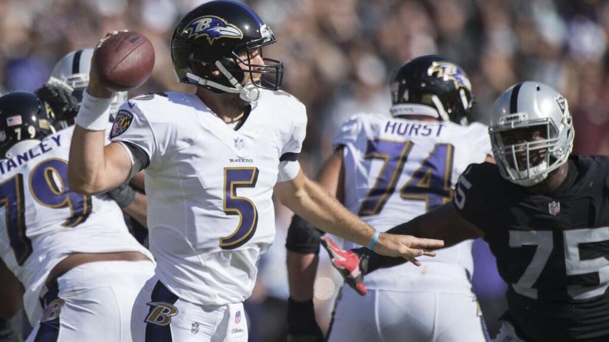 Baltimore Ravens quarterback Joe Flacco (5) makes a pass against the Oakland Raiders on Sunday, Oct. 8, 2017, in Oakland, Calif.