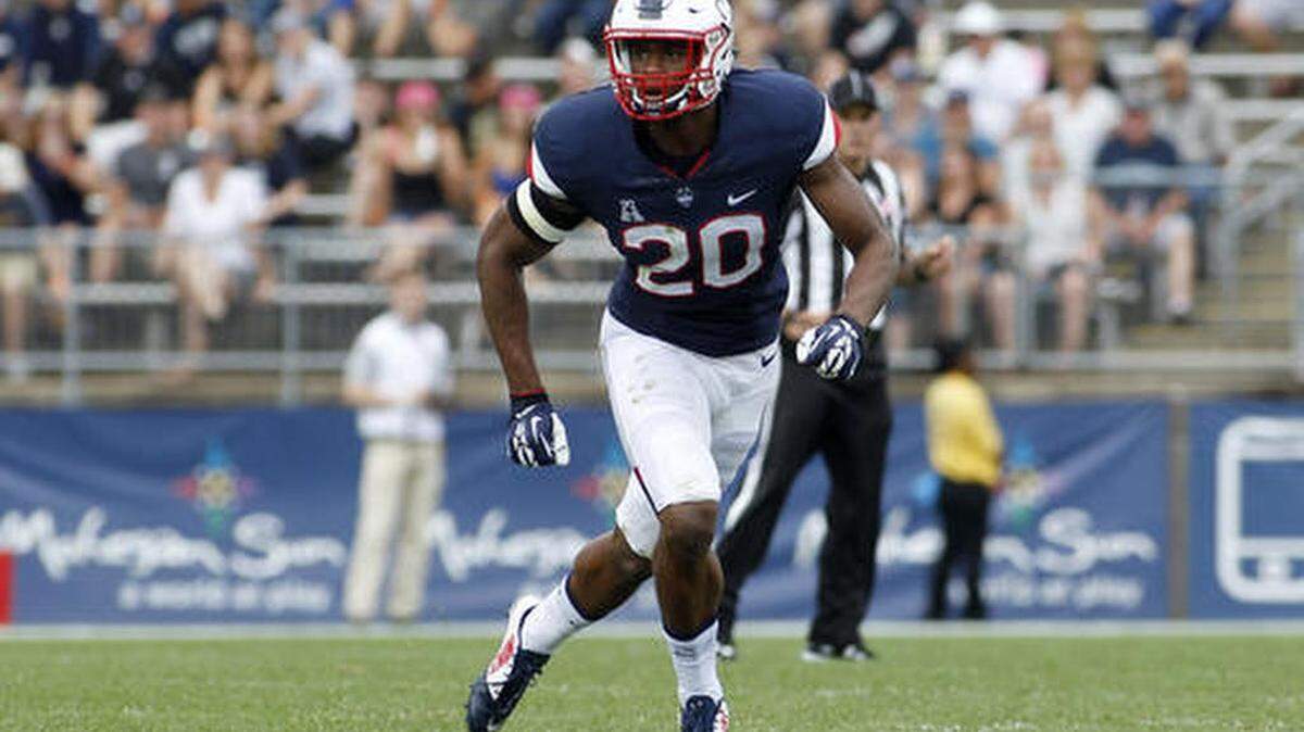 File - In this Sept. 12, 2015, file photo, Connecticut safety Obi Melifonwu (20) follows the play during the third quarter of an NCAA college football game against Army, in East Hartford, Conn. UConn, one of several programs being mentioned as a candidate for expansion by the Big 12, is dealing with something new in head coach Bob Diaco’s third season as its head football coach _ expectations. The defense, which gave up just 19.5 points per game, is expected to be the team’s strength, led by safety Obi Melifonwu, touted by Diaco as the best at his position in the nation.