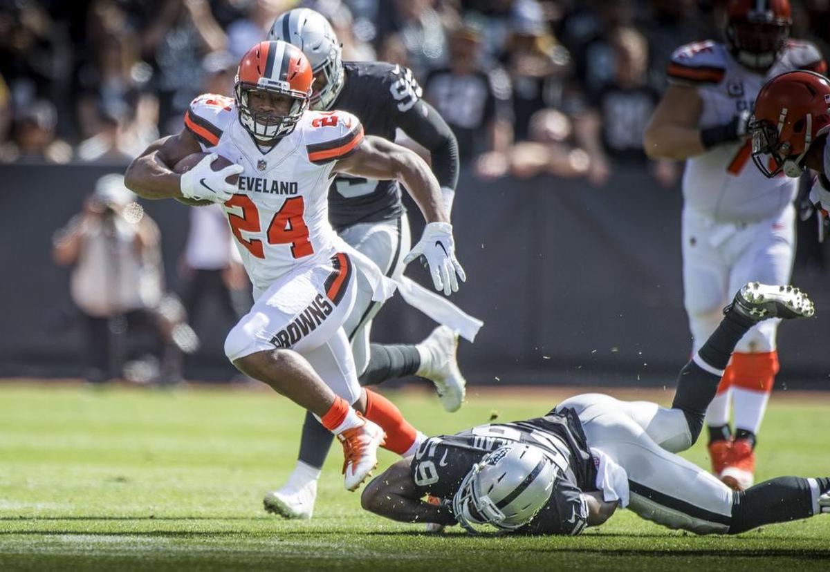 Cleveland Browns running back Nick Chubb (24) runs from Oakland Raiders linebacker Tahir Whitehead (59) for a 63 yard touchdown.