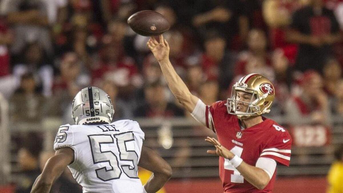 San Francisco 49ers quarterback Nick Mullens (4) throws on the run as Oakland linebacker Marquel Lee (55) closes in during Thursday night’s blowout over the Raiders. Mullens passed for 262 yards and three touchdowns in his NFL debut and deserves another start against the New York Giants on Nov. 12.