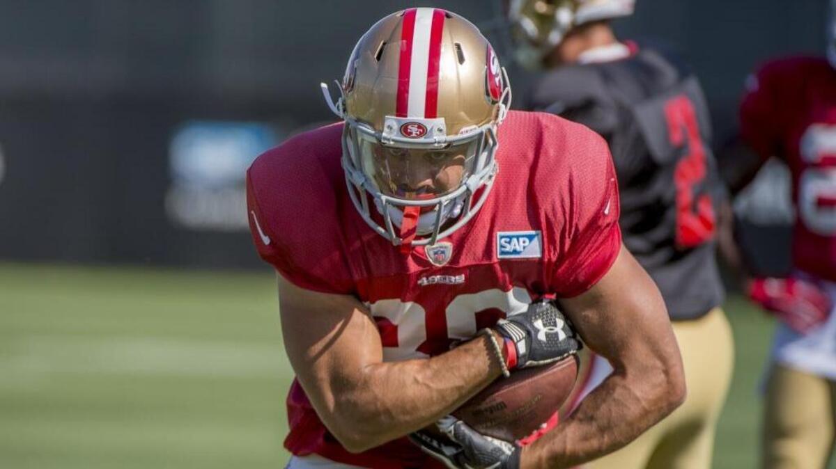 
The San Francisco 49ers’ Jarryd Hayne runs through a drill during the practice. His switch to American football from rugby in Australia has elicited significant comment.
