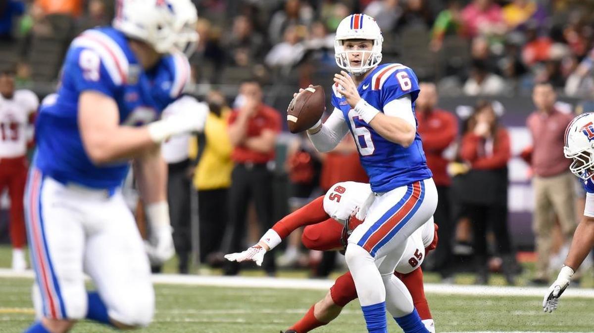 Louisiana Tech quarterback Jeff Driskel (6) looks downfield as Arkansas State defensive end Chase Robison (85) applies pressure during the second half of the New Orleans Bowl college football game in New Orleans, Saturday, Dec. 19, 2015.