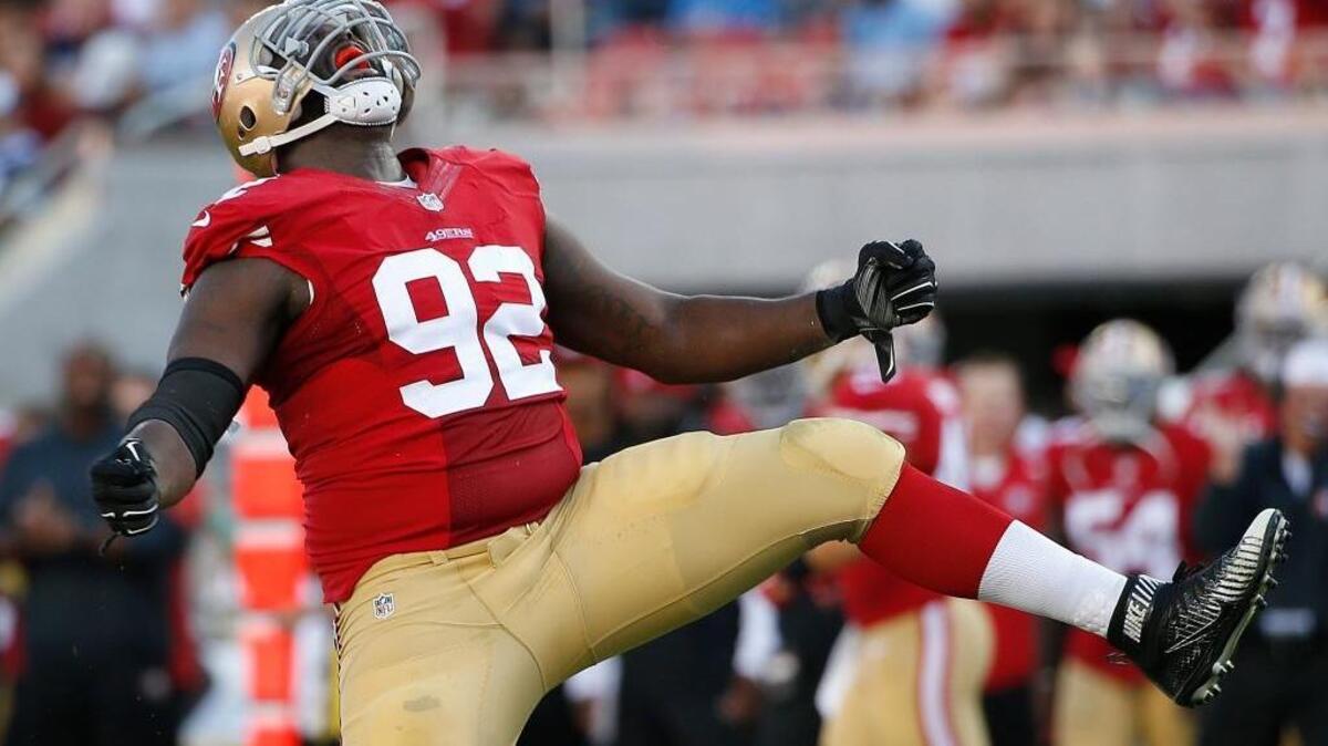San Francisco 49ers defensive end Quinton Dial (92) celebrates during the first half of an NFL preseason football game against the Dallas Cowboys in Santa Clara, Calif., Sunday, Aug. 23, 2015.