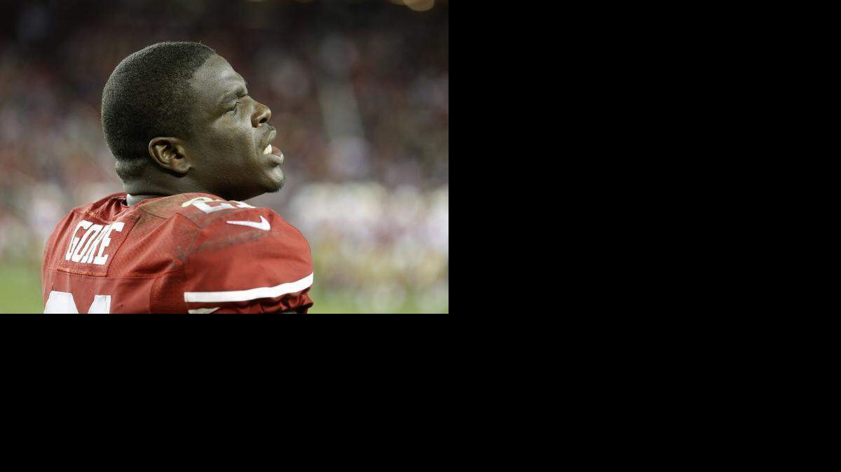 
San Francisco 49ers running back Frank Gore (21) stands on the sideline during the fourth quarter of an NFL football game against the San Diego Chargers in Santa Clara, Calif., Saturday, Dec. 20, 2014. 
