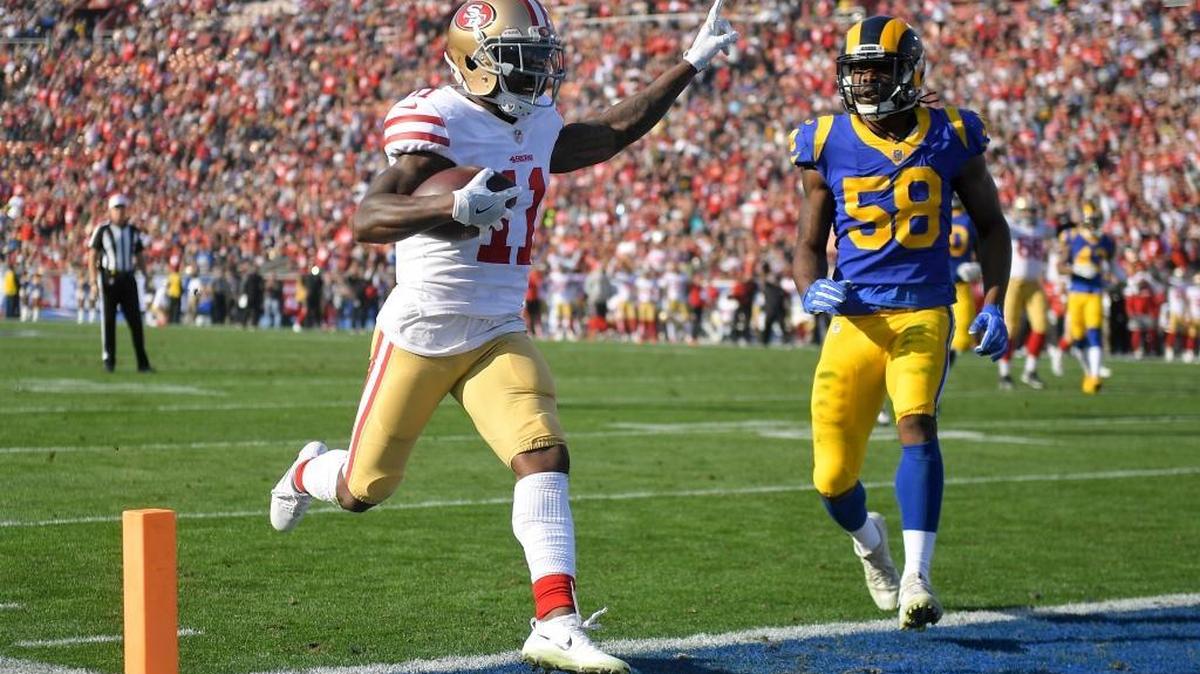 San Francisco 49ers wide receiver Marquise Goodwin celebrates after scoring during the first half of an NFL football game against the Los Angeles Rams Sunday, Dec. 31, 2017, in Los Angeles.