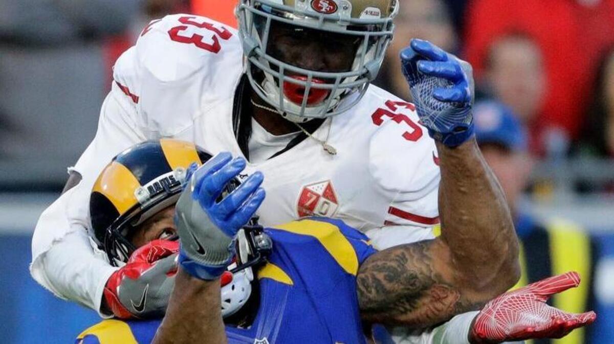 San Francisco 49ers cornerback Rashard Robinson, top, brakes up a pass intended for Los Angeles Rams tight end Lance Kendricks during the second half of an NFL football game, Saturday, Dec. 24, 2016, in Los Angeles.