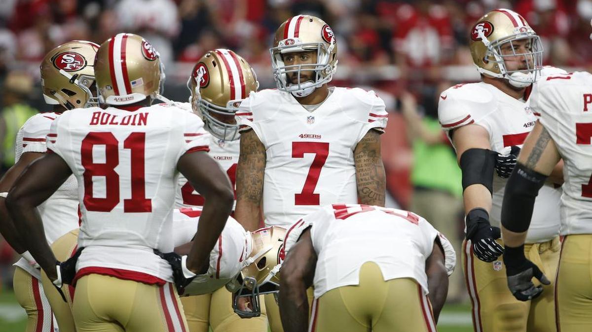 
49ers quarterback Colin Kaepernick (7) calls a play against Arizona during the first half on Sunday, Sept. 27, 2015, in Glendale, Ariz. 
