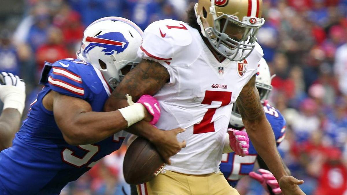Buffalo Bills outside linebacker Lorenzo Alexander (57) hits San Francisco 49ers quarterback Colin Kaepernick in the second half on Sunday, Oct. 16, 2016, in Orchard Park, N.Y.