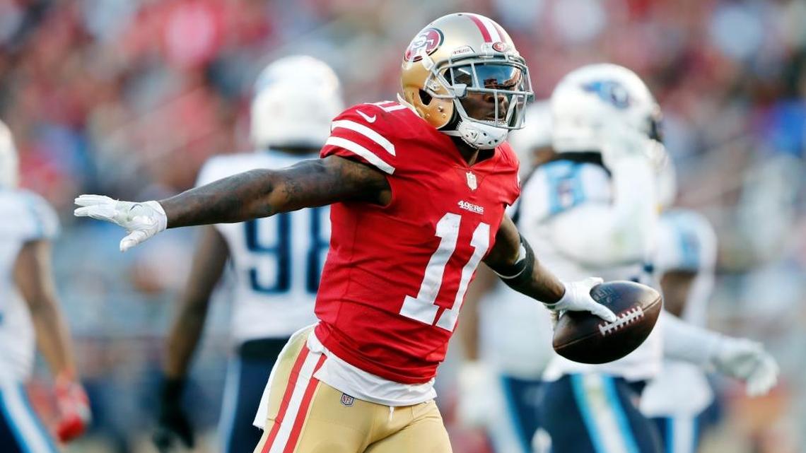 San Francisco 49ers wide receiver Marquise Goodwin celebrates after making a catch against the Tennessee Titans on Sunday in Santa Clara.