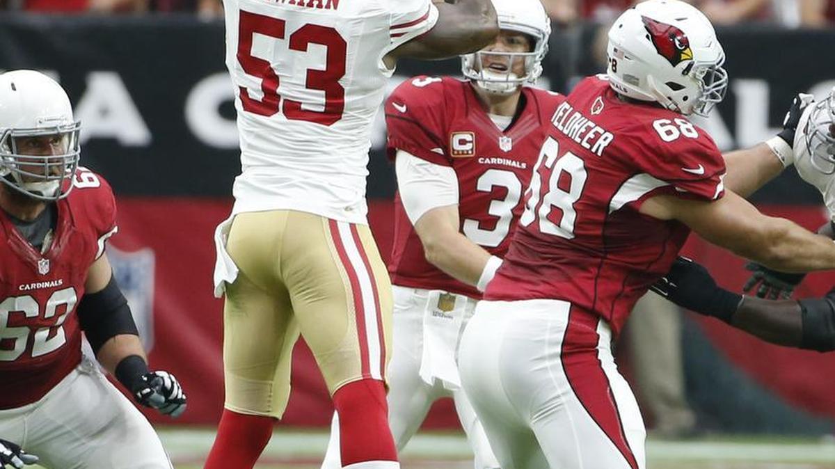 
Arizona Cardinals quarterback Carson Palmer (3) throws over San Francisco 49ers inside linebacker NaVorro Bowman (53) during the first half of an NFL football game, Sunday, Sept. 27, 2015, in Glendale, Ariz. 
