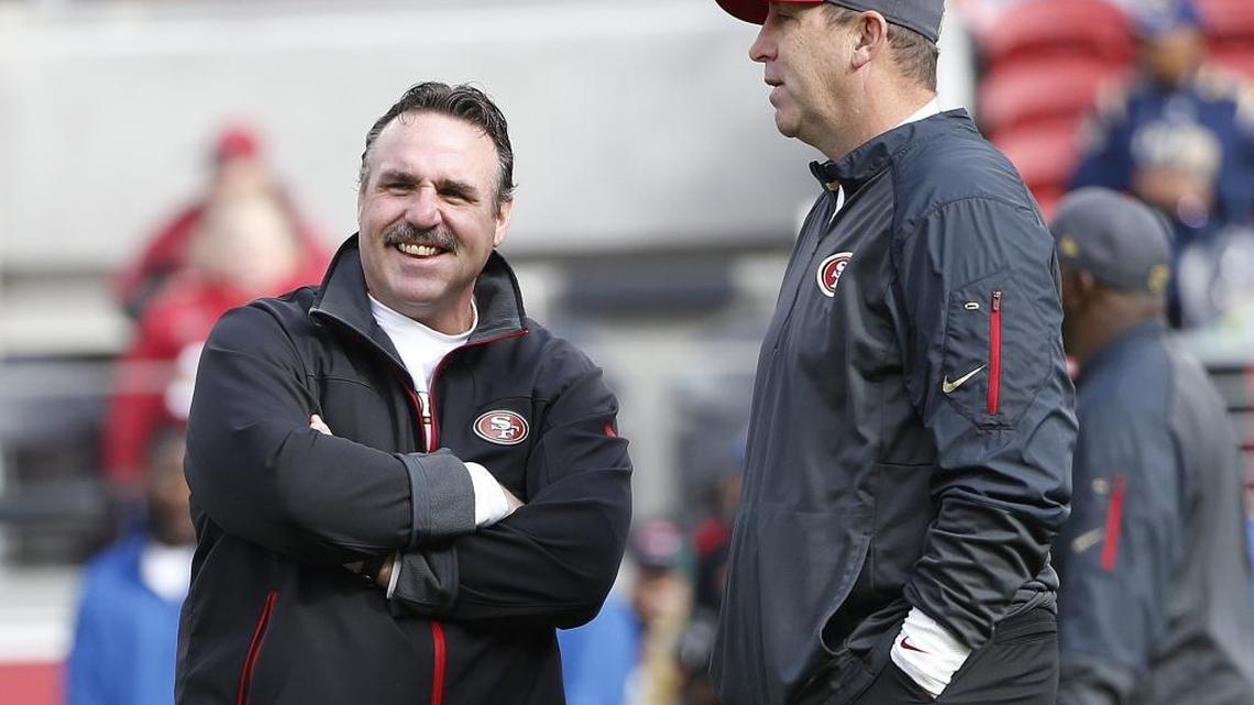 Geep Chryst (right), the San Francisco 49ers’ offensive coordinator under head coach Jim Tomsula (left), who was fired after leading the team to a 4-12 season, also is leaving the team, along with several other Tomsula assistants.