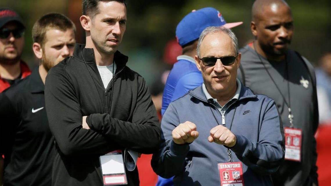 San Francisco 49ers head coach Kyle Shanahan, left, and Chicago Bears defensive coordinator Vic Fangio, right, watch Stanford defensive end Solomon Thomas during NFL football pro day Thursday, March 23, 2017, in Stanford, Calif.