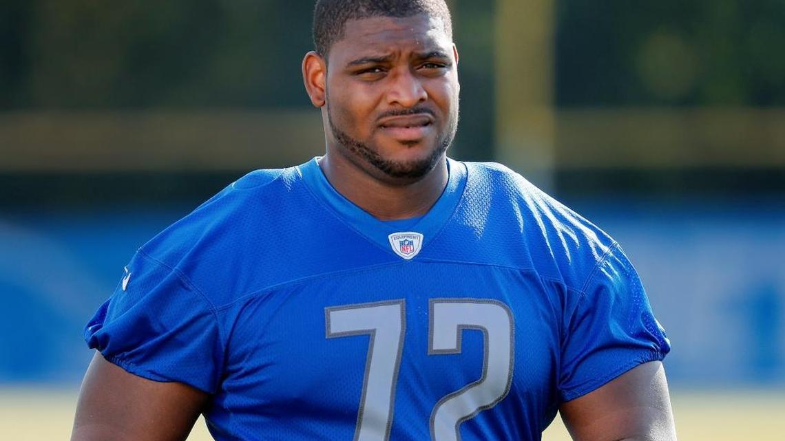 Detroit Lions offensive guard Laken Tomlinson watches during NFL football training camp in Allen Park, Mich., Monday, July 31, 2017.