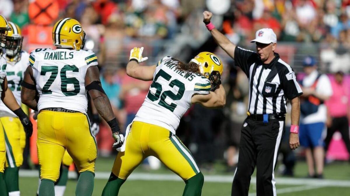 
Green Bay Packers outside linebacker Clay Matthews (52) celebrates after sacking San Francisco 49ers quarterback Colin Kaepernick during the second half of an NFL football game in Santa Clara, Calif., Sunday, Oct. 4, 2015. 
