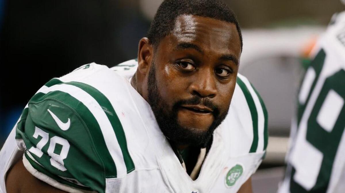 New York Jets defensive tackle Leger Douzable watches against the Buffalo Bills during the second half of an NFL football game in Detroit, Monday, Nov. 24, 2014.