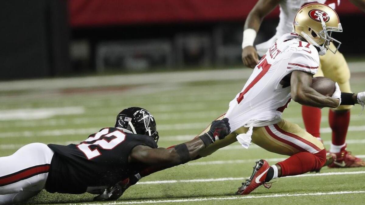 Atlanta Falcons strong safety Keanu Neal tackles 49ers wide receiver Jeremy Kerley during the second half on Sunday, Dec. 18, 2016, in Atlanta.