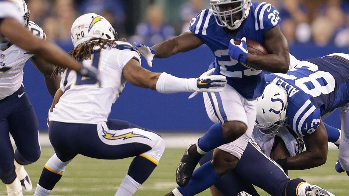 In this Sept. 25, 2016, file photo, Indianapolis Colts' Frank Gore (23) runs past San Diego Chargers' Dwight Lowery (20) during the first half of an NFL football game, Sunday, Sept. 25, 2016, in Indianapolis.