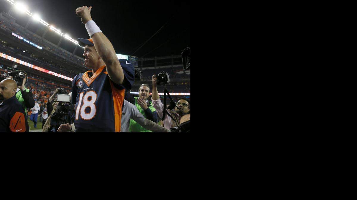 
Peyton Manning leaves the field after an NFL football game against the San Francisco 49ers, Sunday, Oct. 19, 2014, in Denver. The Broncos won 42-17. 
