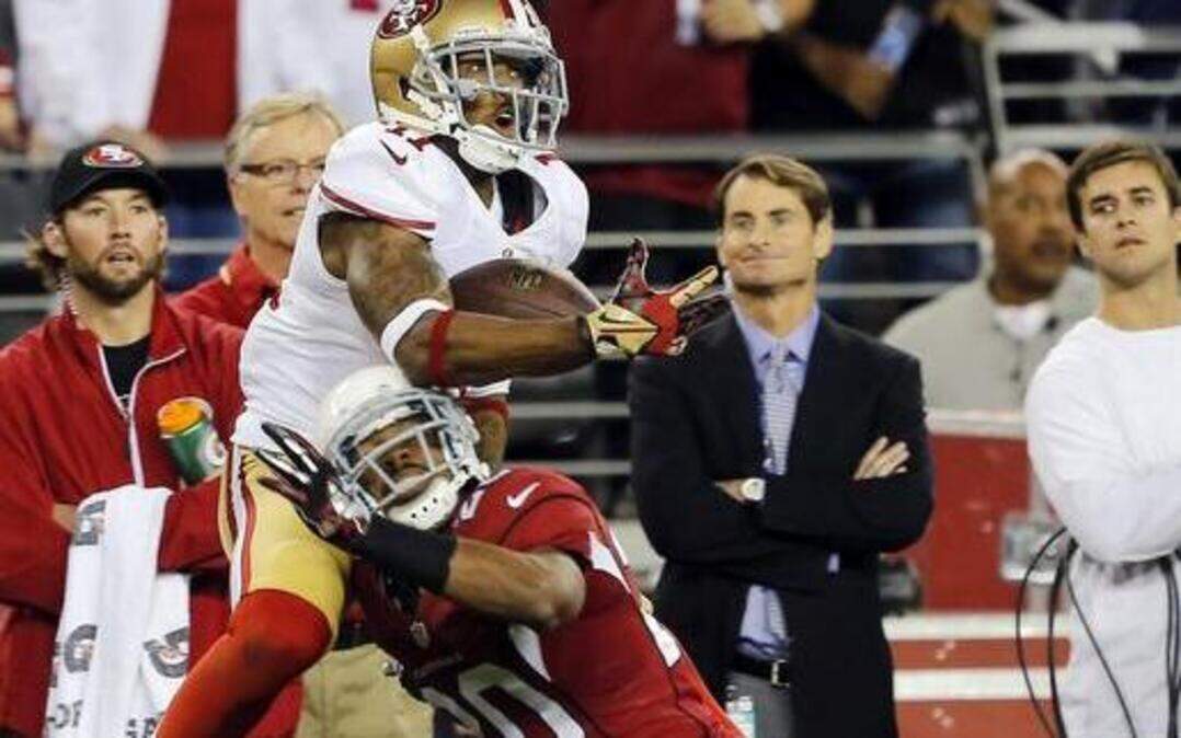 
San Francisco 49ers wide receiver Quinton Patton, top, making a catch against the Arizona Cardinals in 2013, will be activated for his first game after missing the first 12 games of the 2014 season.
