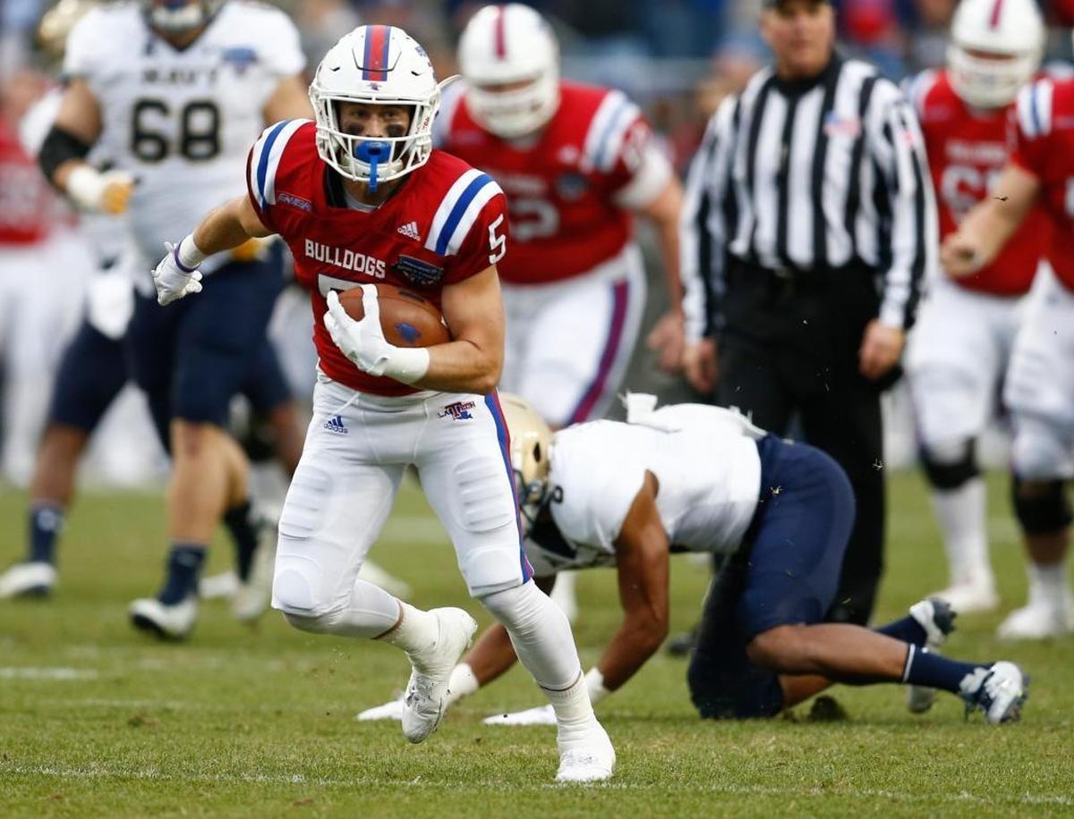 Louisiana Tech wide receiver Trent Taylor (5) runs for a touchdown after a catch against Navy during first half of the Armed Forces Bowl NCAA college football game, Friday, Dec. 23, 2016, in Fort Worth, Texas.
