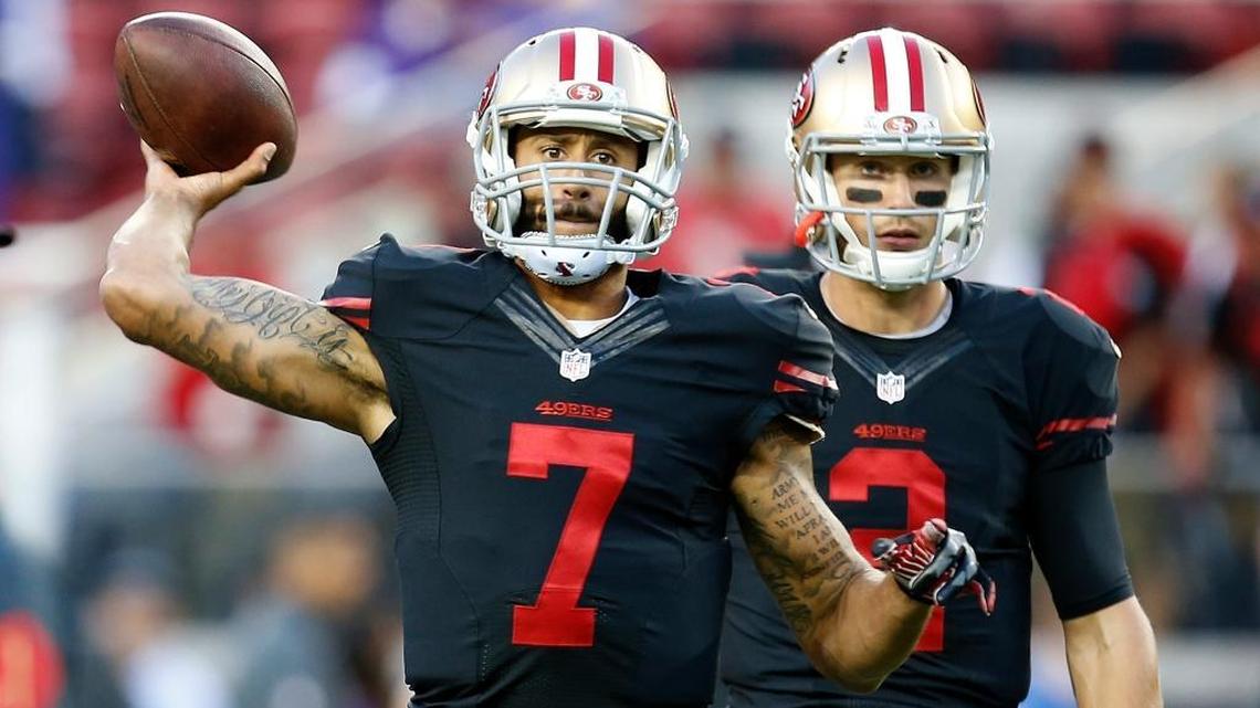 San Francisco 49ers quarterback Colin Kaepernick (7) warms up next to quarterback Blaine Gabbert (2) before an NFL football game against the Minnesota Vikings in Santa Clara, Calif., Monday, Sept. 14, 2015.