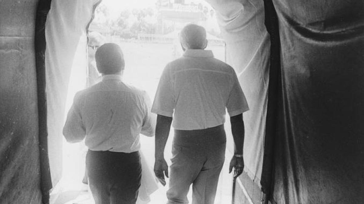 Team photographer Michael Zagaris took this shot of Eddie DeBartolo, left, and Bill Walsh in Miami in 1986. It is DeBartolo’s favorite photo of his time as owner of the team.