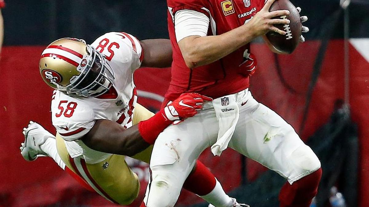Arizona Cardinals quarterback Carson Palmer (3) is sacked by San Francisco 49ers defensive end Elvis Dumervil (58) during the second half of an NFL football game, Sunday, Oct. 1, 2017, in Glendale, Ariz.