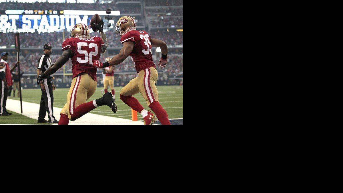 
Patrick Willis and Eric reid celebrate after Willis’ Week 1 interception. The Pro Bowl linebacker will be placed on injured reserve, ending his season. 
