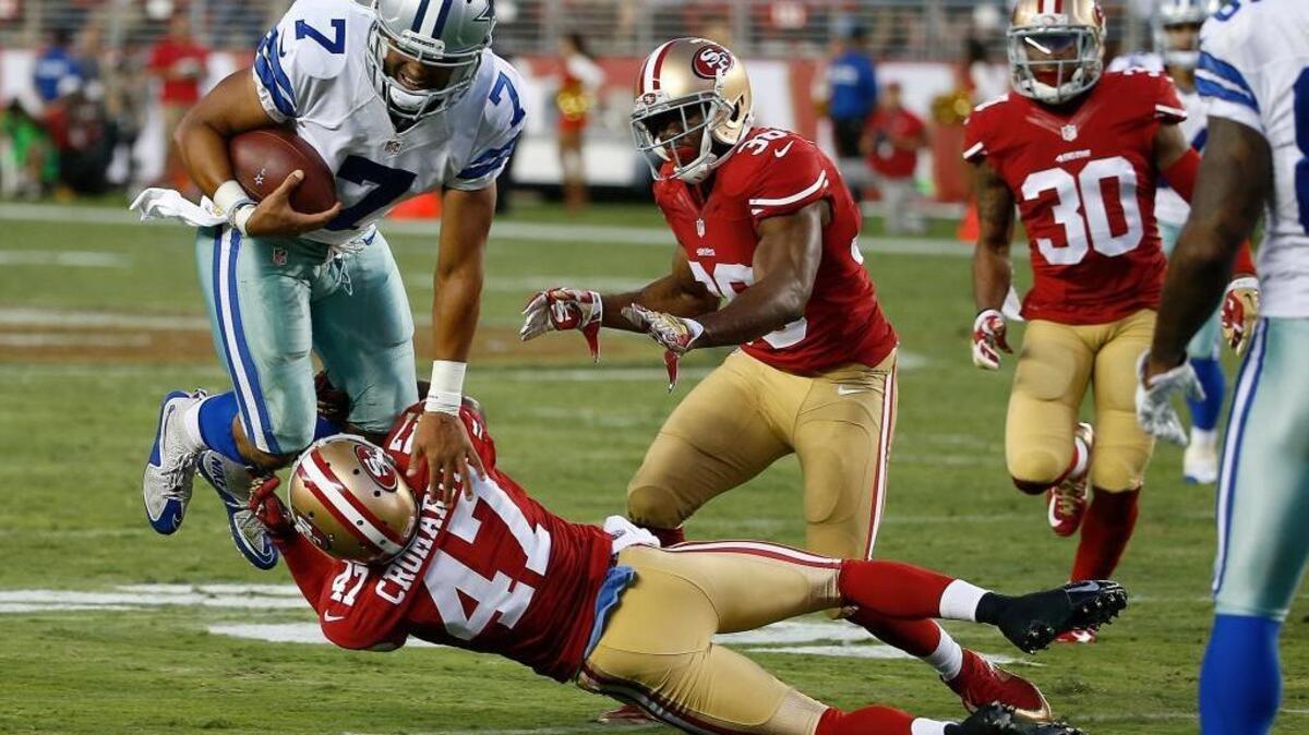 Dallas Cowboys quarterback Jameill Showers (7) is tackled by San Francisco 49ers defensive back Marcus Cromartie (47) during the second half of an NFL preseason football game in Santa Clara, Calif., Sunday, Aug. 23, 2015.
