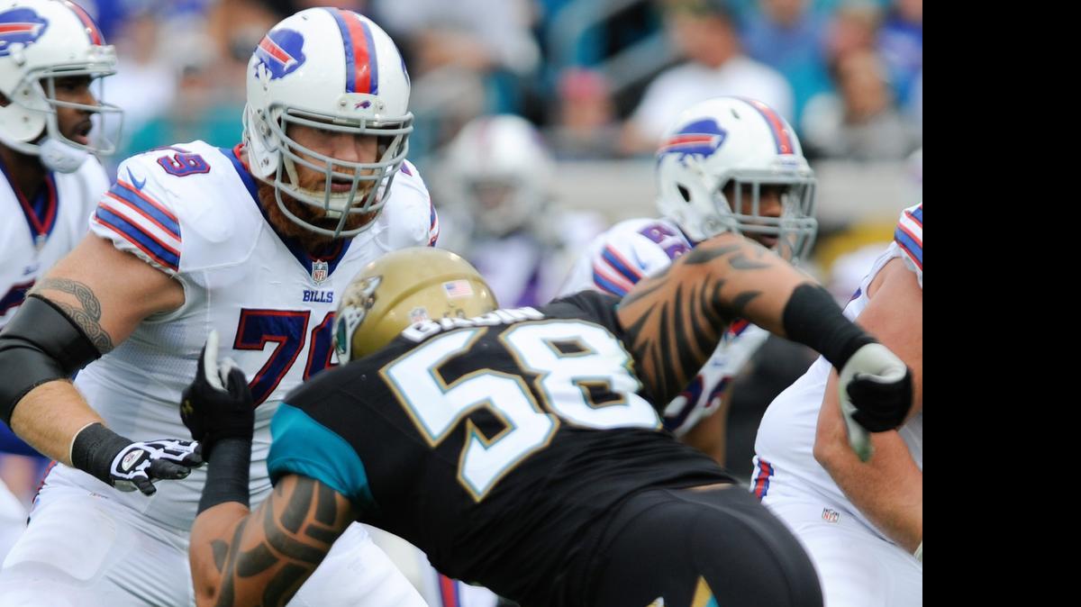 
Buffalo Bills tackle Erik Pears (79) blocks Jacksonville Jaguars defensive end Jason Babin (58) during the first half of an NFL football game in Jacksonville, Fla., Sunday, Dec. 15, 2013. The Bills moved Pears to guard last season.
