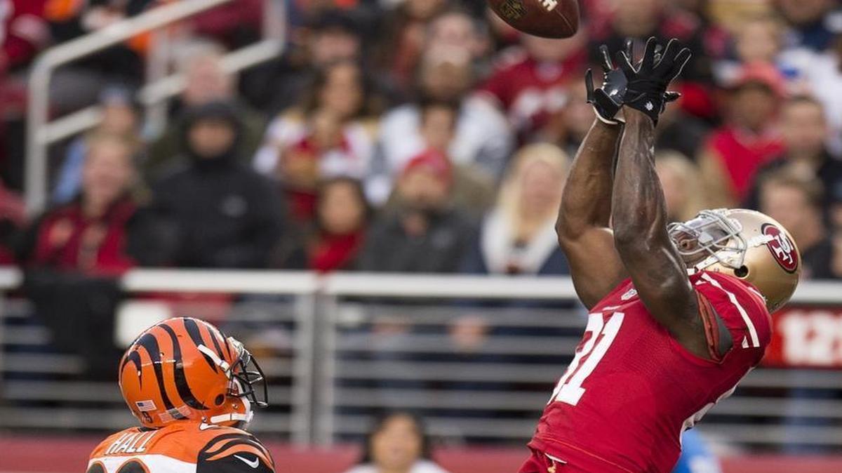 San Francisco 49ers wide receiver Anquan Boldin, who’s about to make his 1,000th catch Sunday against the Lions, said quadruple-digit catches never was a goal of his, that he barely has paid attention to the mark this week and that he's decidedly unconcerned about statistics. In this photo, Boldin (81) beats Cincinnati Bengals strong safety Leon Hall (29) for a touchdown catch in the fourth quarter during a game at Levi's Stadium on Sunday December 20, 2015 in Santa Clara, Calif.