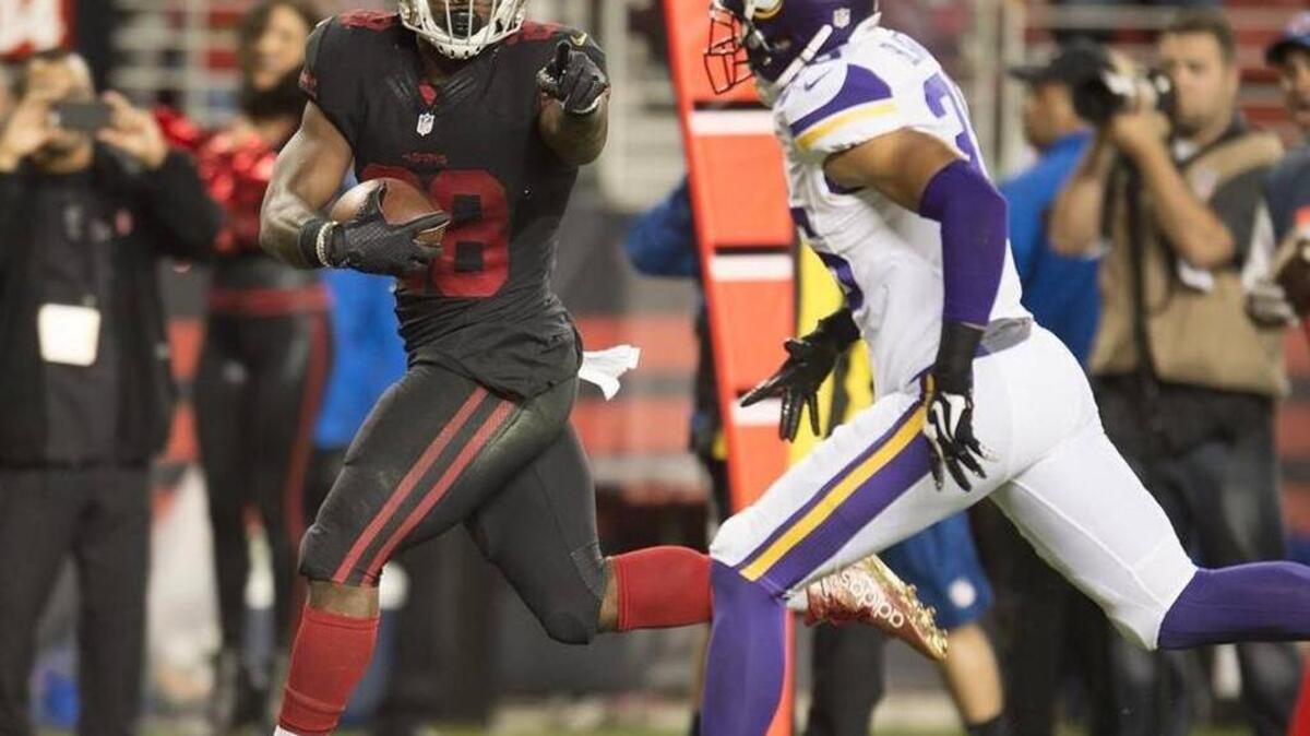 
Carlos Hyde scores on a 17-yard run in the fourth quarter Monday. The 49ers scored just two offensive touchdowns in the fourth quarter last season.
