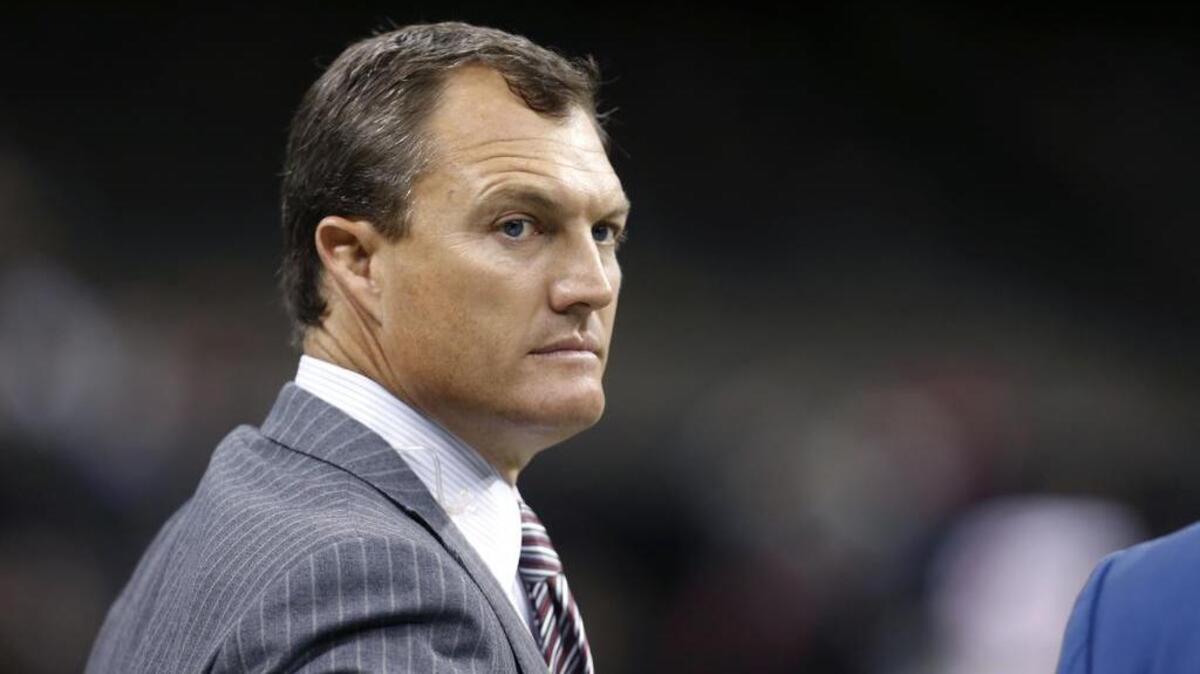 This Nov. 9, 2014 photo shows former NFL player John Lynch on the sideline before an NFL football game between the New Orleans Saints and the San Francisco 49ers in New Orleans.