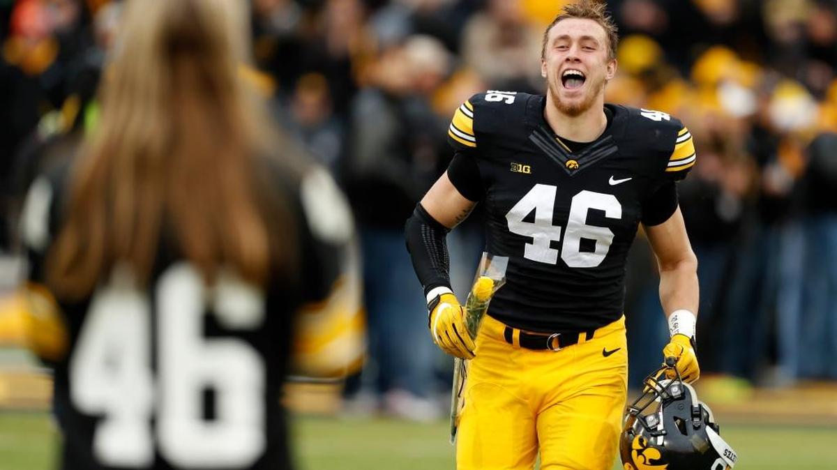 Iowa tight end George Kittle runs onto the field during senior day ceremonies before an NCAA college football game against Nebraska, Friday, Nov. 25, 2016, in Iowa City, Iowa.
