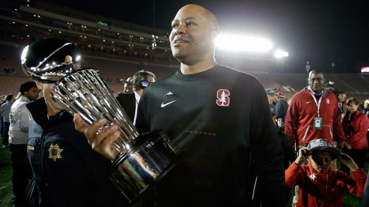 Stanford head coach David Shaw walks off the field after their win in the Rose Bowl NCAA college football game against Iowa, Friday, Jan. 1, 2016, in Pasadena.