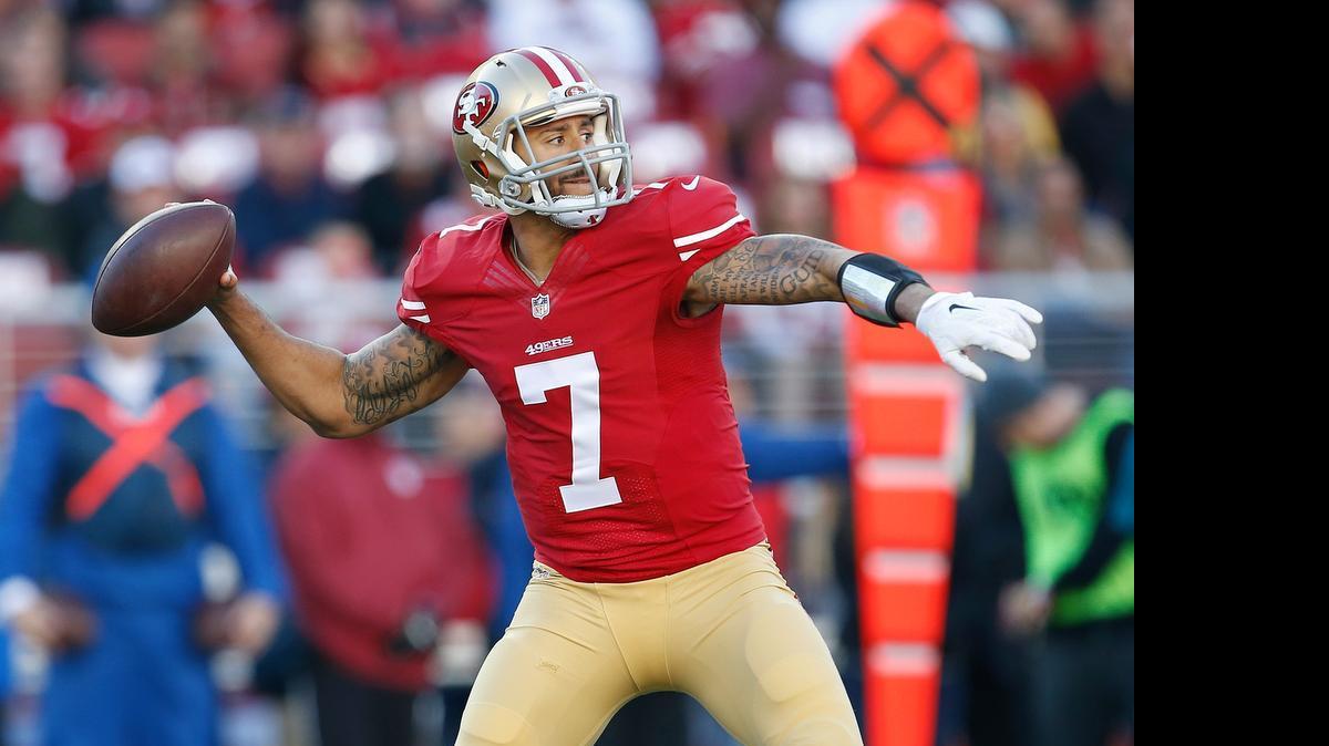 
San Francisco 49ers quarterback Colin Kaepernick (7) passes against the Arizona Cardinals during the second quarter of an NFL football game in Santa Clara, Calif., Sunday, Dec. 28, 2014. 

