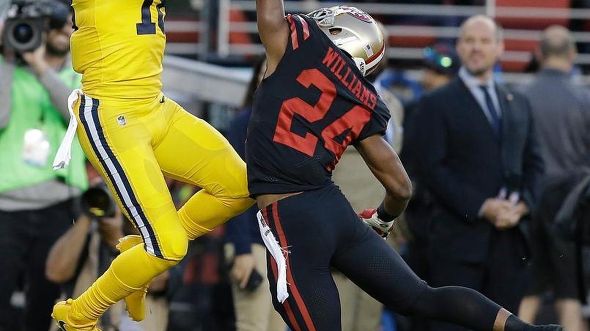 Los Angeles Rams wide receiver Cooper Kupp jumps for a pass over San Francisco 49ers defensive back K'Waun Williams (24) during the first half of an NFL football game in Santa Clara, Calif., Thursday, Sept. 21, 2017.
