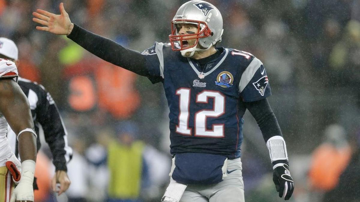 New England Patriots quarterback Tom Brady reacts in the third quarter an NFL football game against the San Francisco 49ers in Foxborough, Mass., Sunday, Dec. 16, 2012.
